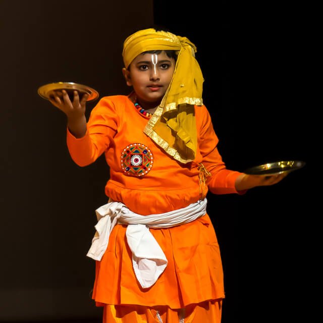 Close-up of a young NSDA Elite Junior student practicing Indian folk dance.