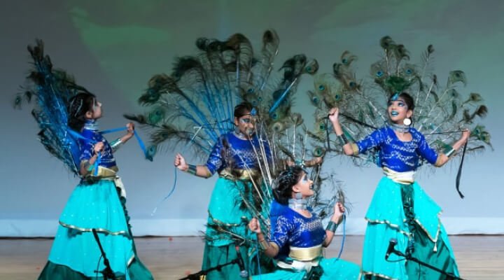 NSDA students performing the Mayilattam folk dance.